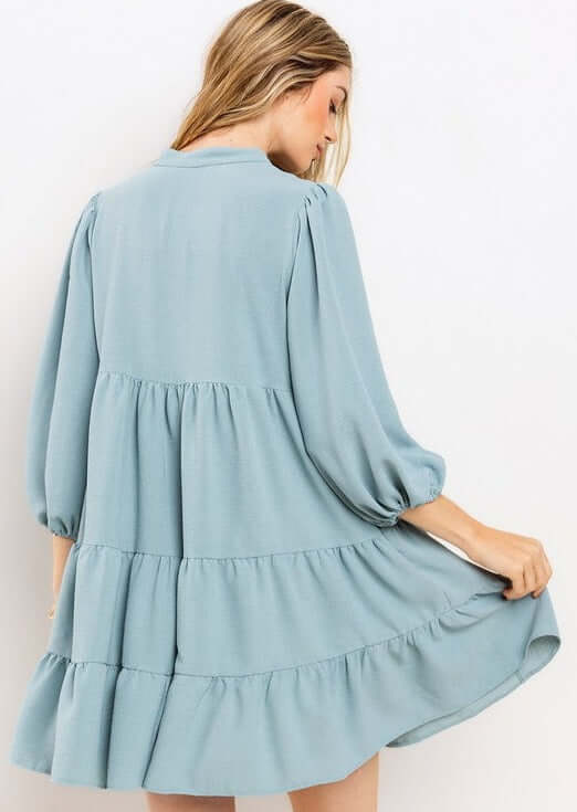 Proudly Made in the USA! Women's Light Blue Smocking Tie Front Baby Doll Tiered Dress with Half Sleeves and Pintuck Front Detail | Classy Cozy Cool Made in America Boutique