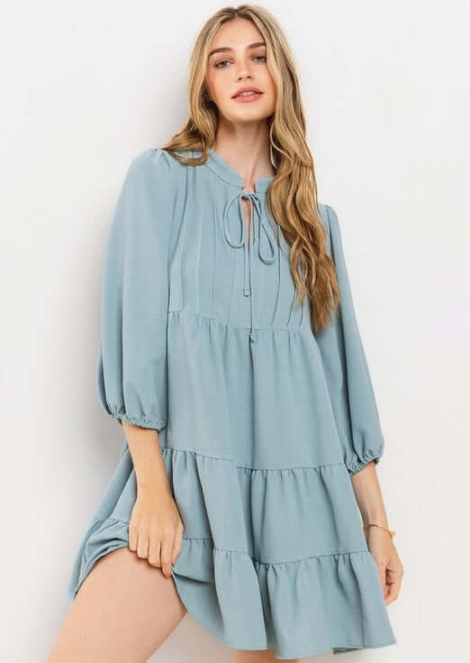 Proudly Made in the USA! Women's Light Blue Smocking Tie Front Baby Doll Tiered Dress with Half Sleeves and Pintuck Front Detail | Classy Cozy Cool Made in America Boutique