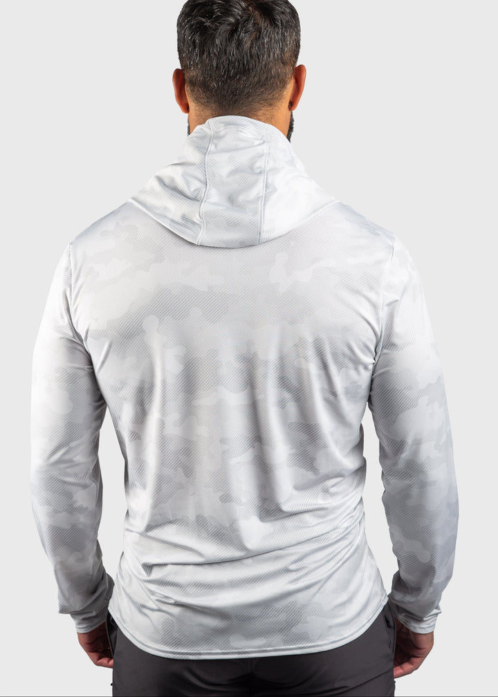 Stay comfortable and protected in the Distressed Flag Performance Mesh White Out Sun Hoodie. Crafted with performance mesh for enhanced ventilation, it keeps you cool during any activity. Featuring built-in UPF 50 sun protection, it shields your skin from harmful rays. This versatile unisex hoodie combines functionality with style, proudly made in the USA since 1990 for quality you can trust. Perfect for outdoor adventures or casual wear, it keeps you covered and comfortable all day long.