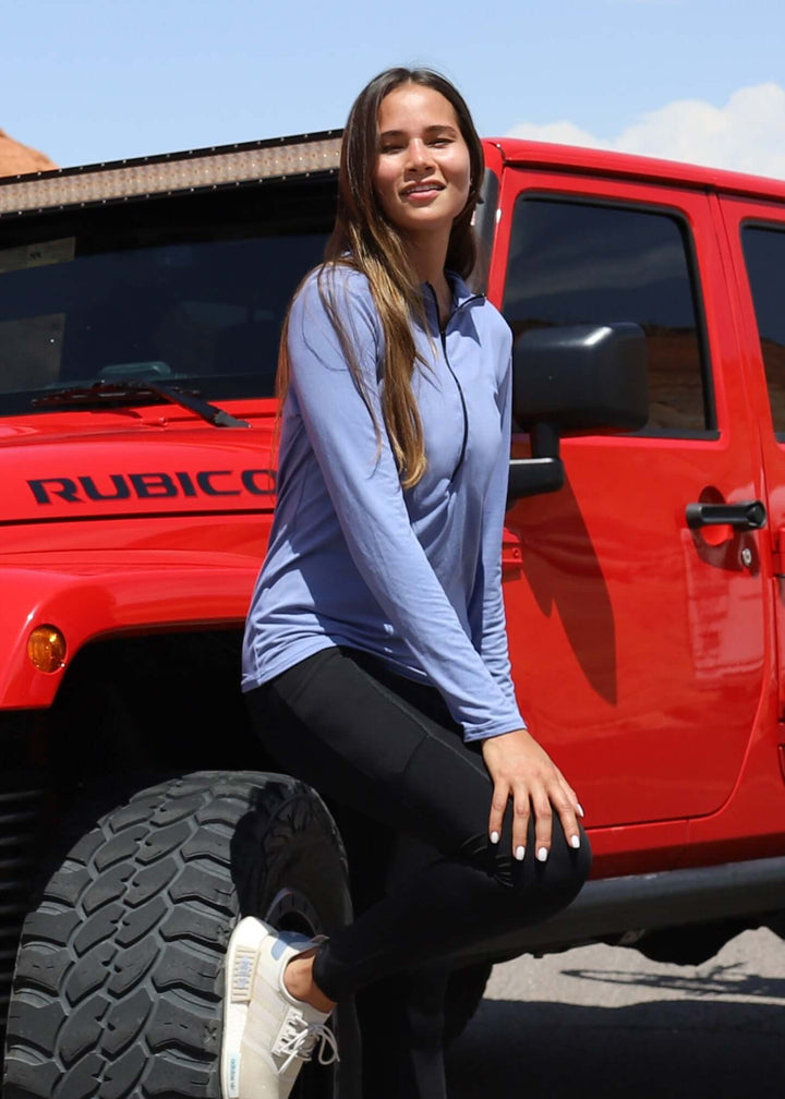 Made in USA WSI Sportswear Women's Oasis Long Sleeve 1/2 Zip SoftTECH™ Pullover in Light Blue, Machine wash, Advanced wicking properties, anti-microbial properties, UV Protection