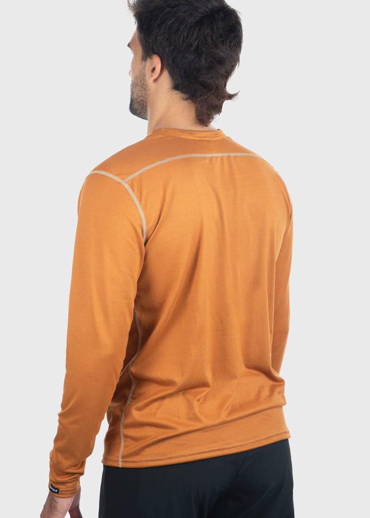 Experience comfort and protection with the Essential SoftTECH™ Shirt. This lightweight long sleeve tee features a relaxed fit, back yoke, and flat seams designed to keep you comfortable all day. Built-in UPF 50 offers reliable sun protection, making it perfect for any spring activity. Available in multiple colors and proudly made in the USA since 1990, this shirt is a versatile wardrobe essential you'll reach for again and again.