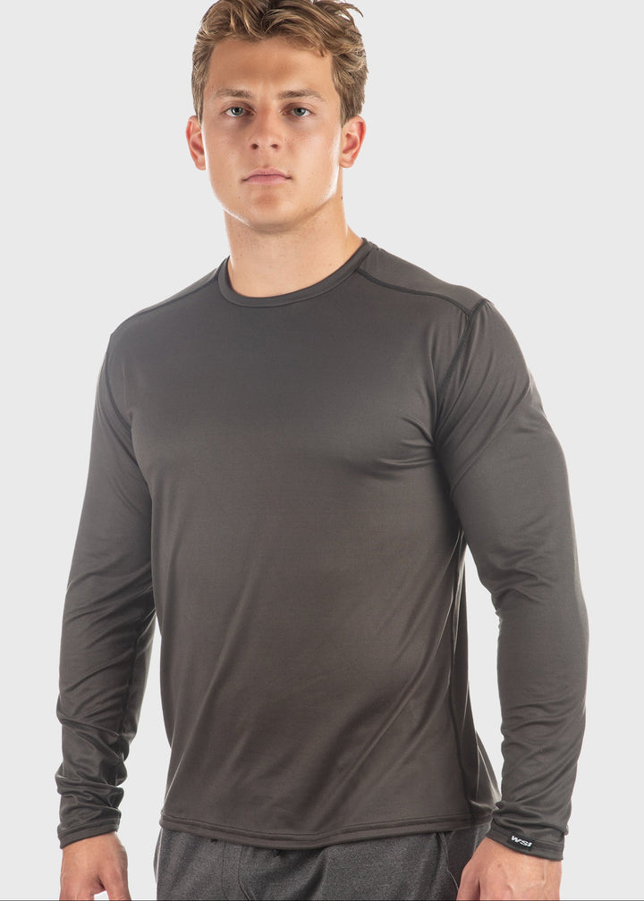 Experience all-day comfort with the Essential SoftTECH™ Shirt, designed for men who value lightweight, breathable wear. Featuring a relaxed fit, back yoke, and flat seams, this long sleeve tee moves with you while reducing irritation. Ideal for spring activities, it offers built-in UPF 50 protection to shield your skin from the sun’s harmful rays. Choose from multiple colors and enjoy quality you can trust—proudly made in the USA since 1990. Elevate your everyday wardrobe with this versatile essential.