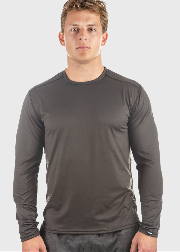 Experience all-day comfort with the Essential SoftTECH™ Shirt, designed for men who value lightweight, breathable wear. Featuring a relaxed fit, back yoke, and flat seams, this long sleeve tee moves with you while reducing irritation. Ideal for spring activities, it offers built-in UPF 50 protection to shield your skin from the sun’s harmful rays. Choose from multiple colors and enjoy quality you can trust—proudly made in the USA since 1990. Elevate your everyday wardrobe with this versatile essential.