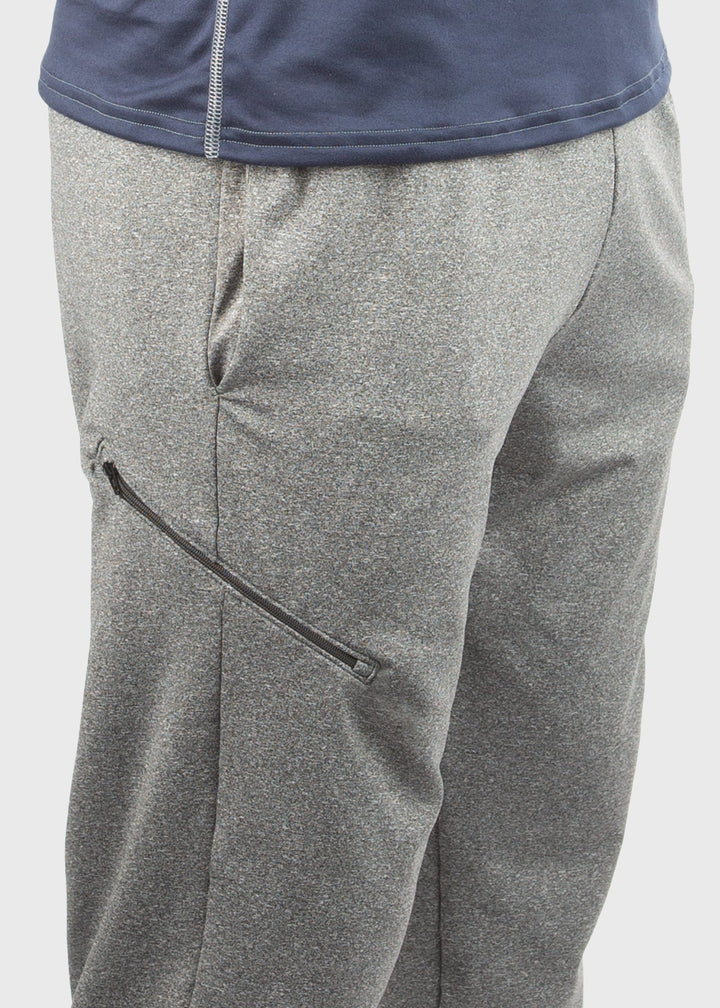 Crafted from durable 8oz ProWikMax™ fleece, these Men's sweatpants offer a loose fit and a brushed lining for exceptional comfort and warmth. The fabric blend of 88% polyester and 12% spandex ensures flexibility and lasting wear. Thoughtfully designed with side pockets, a welt leg pocket, and cuffed hems for a secure fit, they perform well as a standout layering option through fall and winter. Proudly made in the USA since 1990, these sweatpants combine expert craftsmanship with functional design.