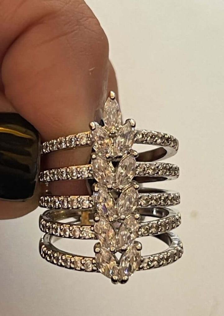 Made in USA, The Dance the Night Away Women's Fashion Jewelry Ring by Artist Anuja Tola is made of  Stainless Steel and 22 Karat Plating, accented with sparkling cubic zirconia stones