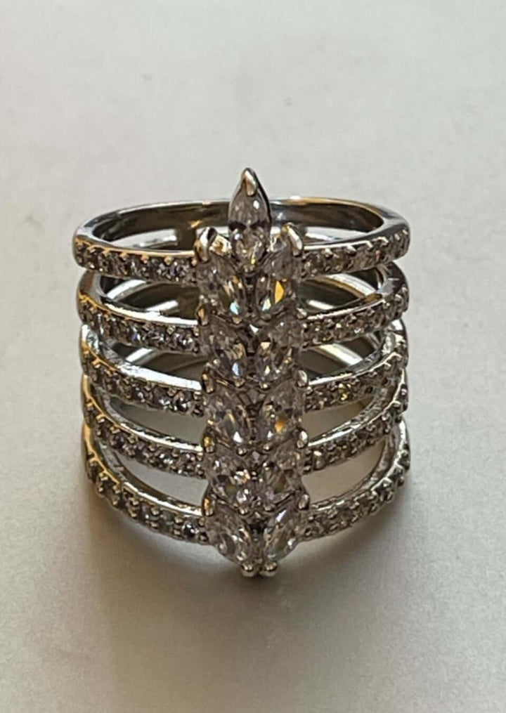 Made in USA, The Dance the Night Away Women's Fashion Jewelry Ring by Artist Anuja Tola is made of  Stainless Steel and 22 Karat Plating, accented with sparkling cubic zirconia stones