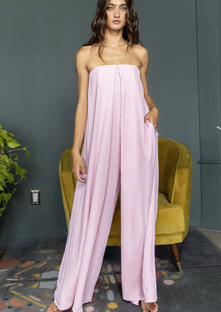 Bucket List Clothing Style R5307 | Ladies Strapless Flowy Pink Jumpsuit with Inverted Front Pleating and Side Pockets | Made in USA