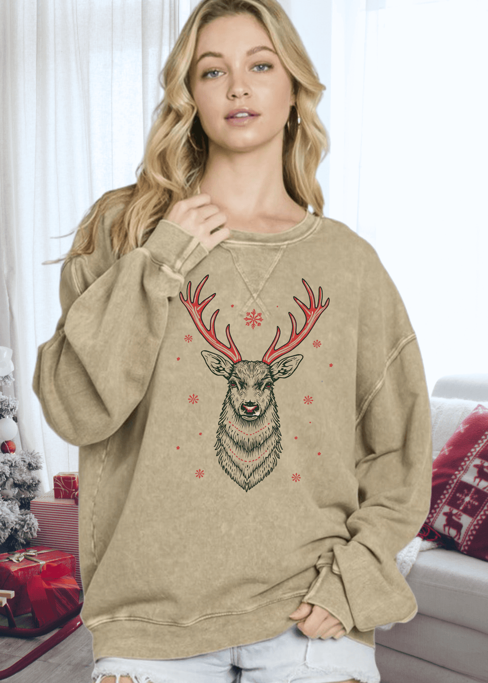 This vintage-inspired oversized sweatshirt features a striking Art Deco red antler reindeer graphic on mineral-washed antique mocha cotton. Crafted in the USA from premium 100% medium-weight cotton