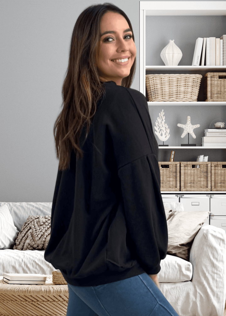 Elevate your cozy game with the "Six Seven" sweatshirt—a playful oversized essential that's anything but basic, in black with white graphic.  This medium-weight French terry piece features a bold graphic on black, paired with a chic keyhole cutout at the back for unexpected flair. Made in USA