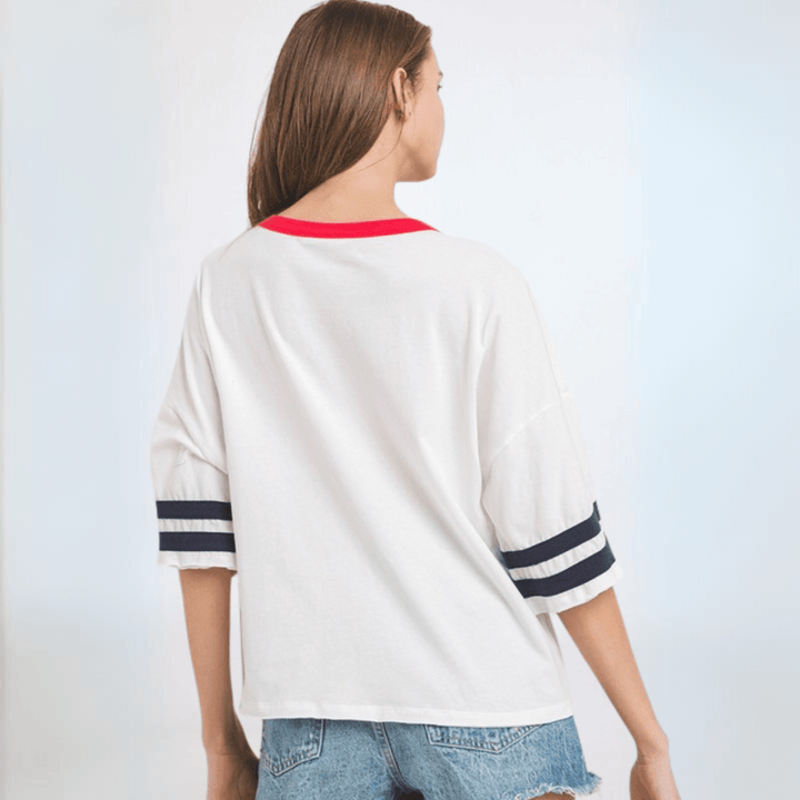 Made in USA Women's Patriotic Cotton USA Graphic Oversized T-Shirt Navy Stripes on Sleeves and Red Detail Round Neckline | Classy Cozy Cool Made in America Boutique
