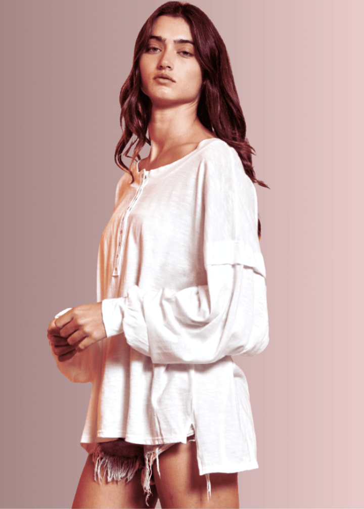 USA Made Ladies Oversized White Cotton Long Sleeve Tee with Raw Edge Detail and Snap Down Front | Bucket List Clothing Style# T1912