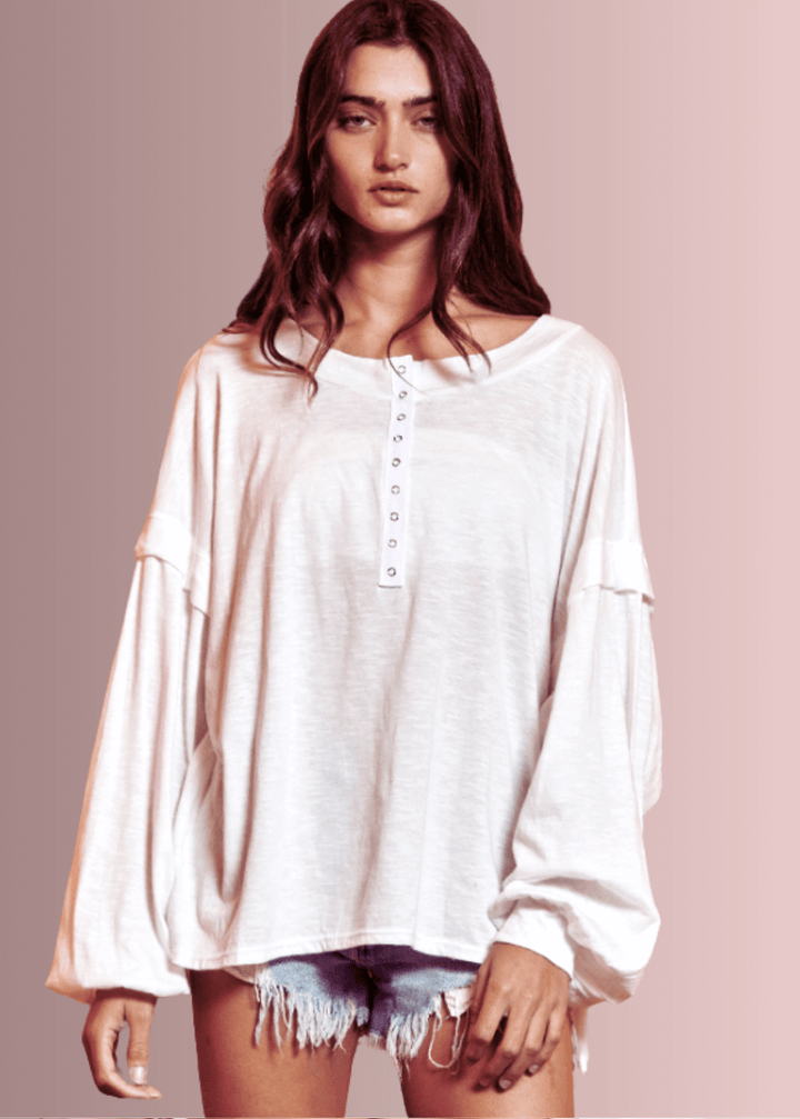 USA Made Ladies Oversized White Cotton Long Sleeve Tee with Raw Edge Detail and Snap Down Front | Bucket List Clothing Style# T1912
