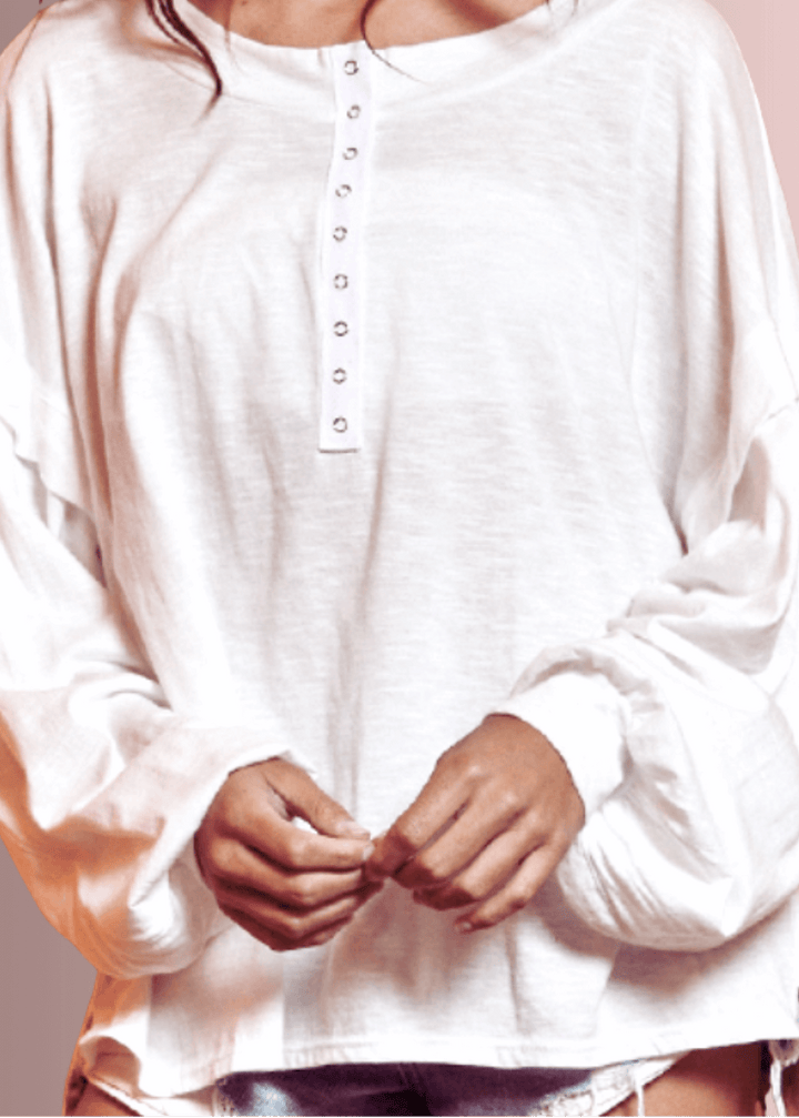 USA Made Ladies Oversized White Cotton Long Sleeve Tee with Raw Edge Detail and Snap Down Front | Bucket List Clothing Style# T1912