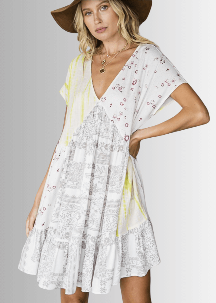 Made in USA Contrast Baby Doll Mini Dress, Short Sleeves, Flounce Ruffle Hem, Mixed Floral Patterns of White, Grey, Yellow and Magenta | Bucket List Style D3024