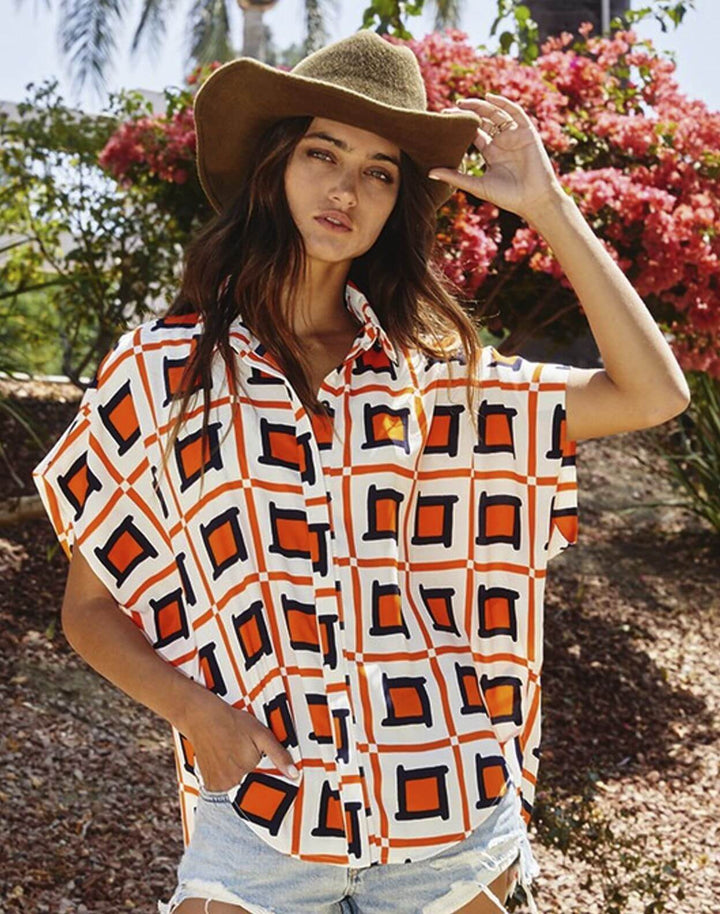 Bucket List Style T1702 Ladies Button Down Hidden Placket High Low Top in Navy, Orange & White Geo Print | Made in USA | Women's Clothing Made in America
