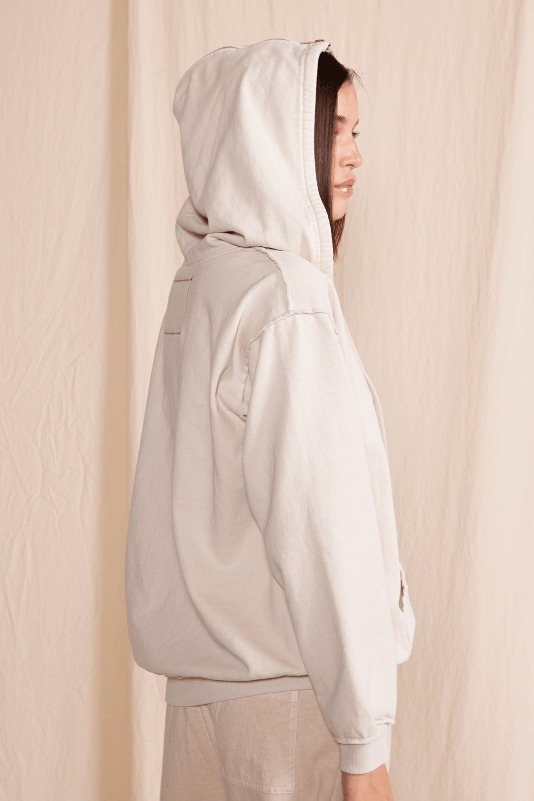 Stay cozy in our Midnight Hoodie, made with 100% heavy cotton for ultimate comfort. With a zip-up design and ribbed cuffs and waist, this relaxed fit hoodie is perfect for any adventure. 