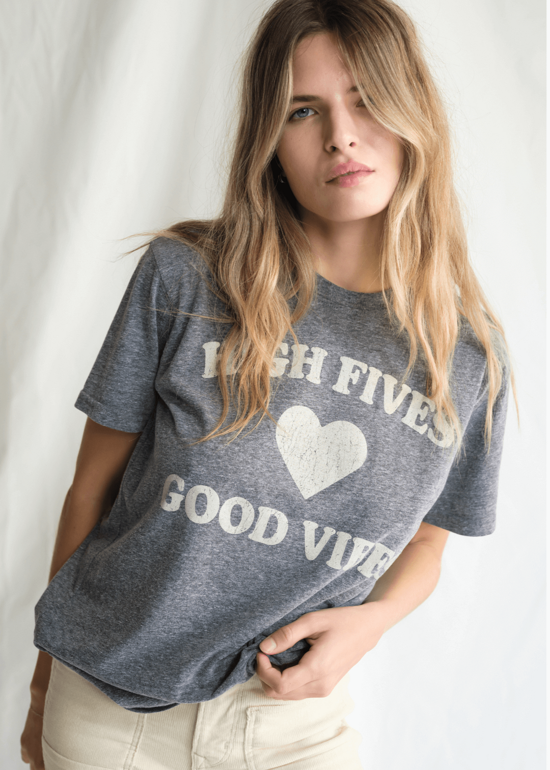 Spread positivity and style wherever you go with our "High Fives, Good Vibes" graphic tee! This shirt is more than just clothing- it's a wearable mood booster