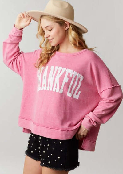 Made in USA Women's Oversized Graphic Garment Washed Vintage Look Sweatshirt with "Thankful" Graphic Lettering and Raw seam detail in Pink | Classy Cozy Cool Women's Made in America Boutique