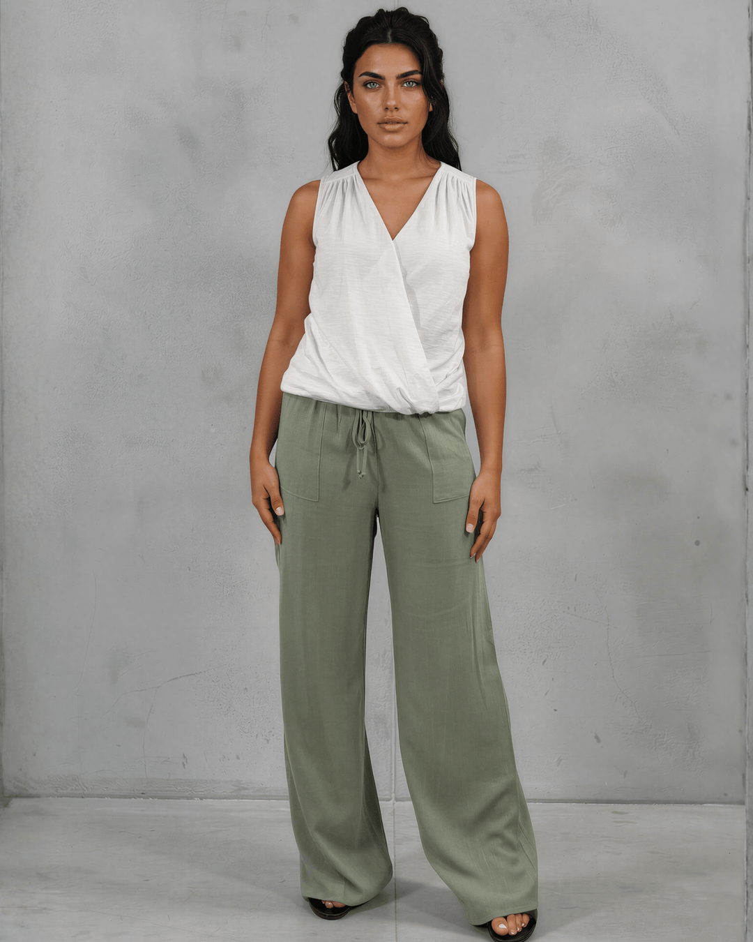 Shop the Courtney Cotton Surplice V Neck Top in White. Relaxed blousy fit, feminine V-neckline, soft 95% cotton. Proudly made in the USA. Sizes S–L.  Renee C Style 3463TP