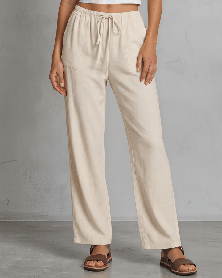 Annie wide leg pants in natural — adjustable drawstring waist, side pockets, rayon-linen blend. Relaxed fit, Made in USA. Perfect for resort &amp; vacation wear.