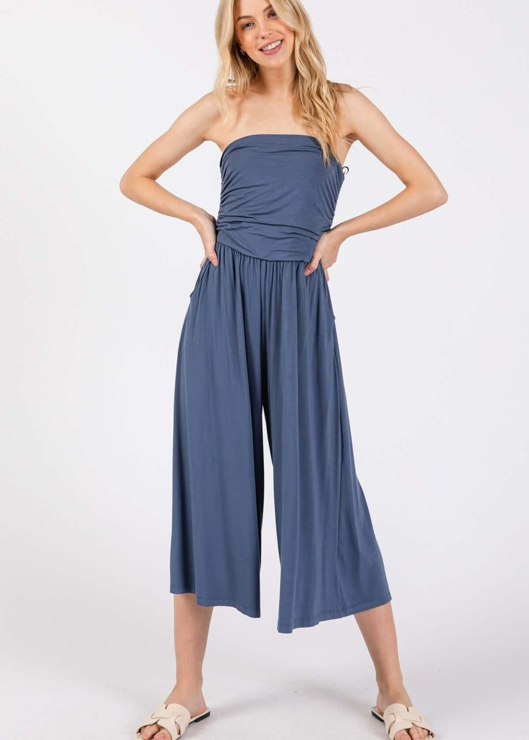Effortlessly chic — the Modern Navy Tube Top Romper with ruched bodice, wide-leg capri pants & side pockets. Soft rayon modal. Made in USA.
