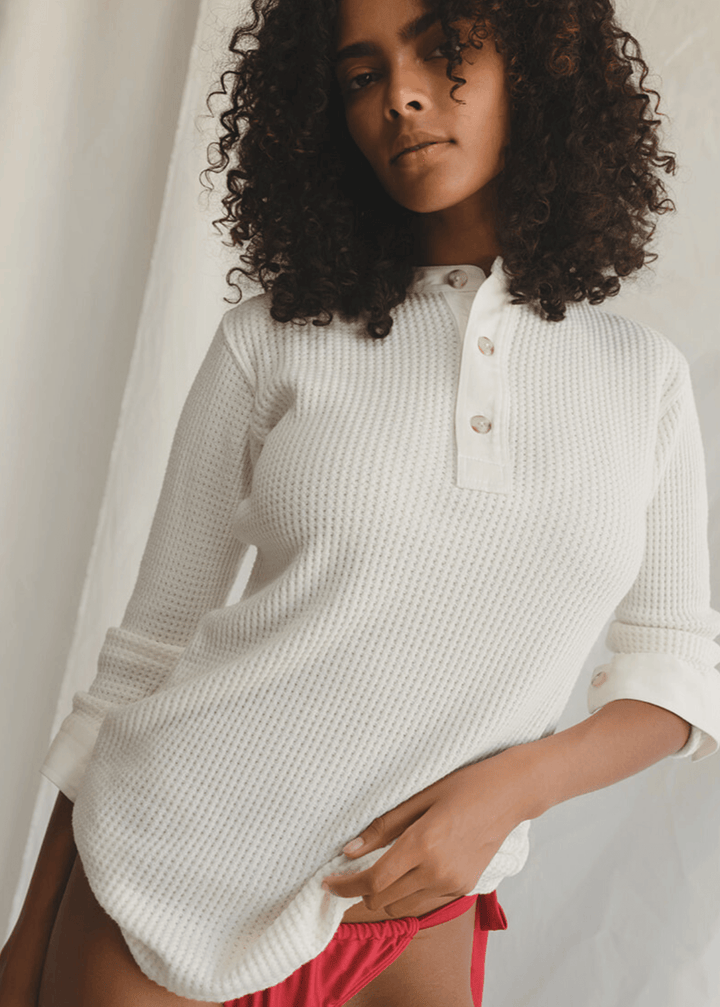 Get ready to cozy up in cloud-like softness with this waffle knit wonder by People of Leisure! Our three-button mock shirt is your new best friend, crafted from a dreamy blend of 50% Hemp, 48% Organic Cotton, and a hint of stretchy Spandex 