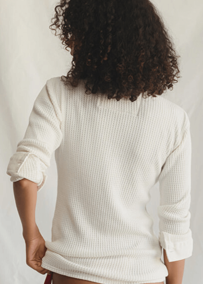 Get ready to cozy up in cloud-like softness with this waffle knit wonder by People of Leisure! Our three-button mock shirt is your new best friend, crafted from a dreamy blend of 50% Hemp, 48% Organic Cotton, and a hint of stretchy Spandex 