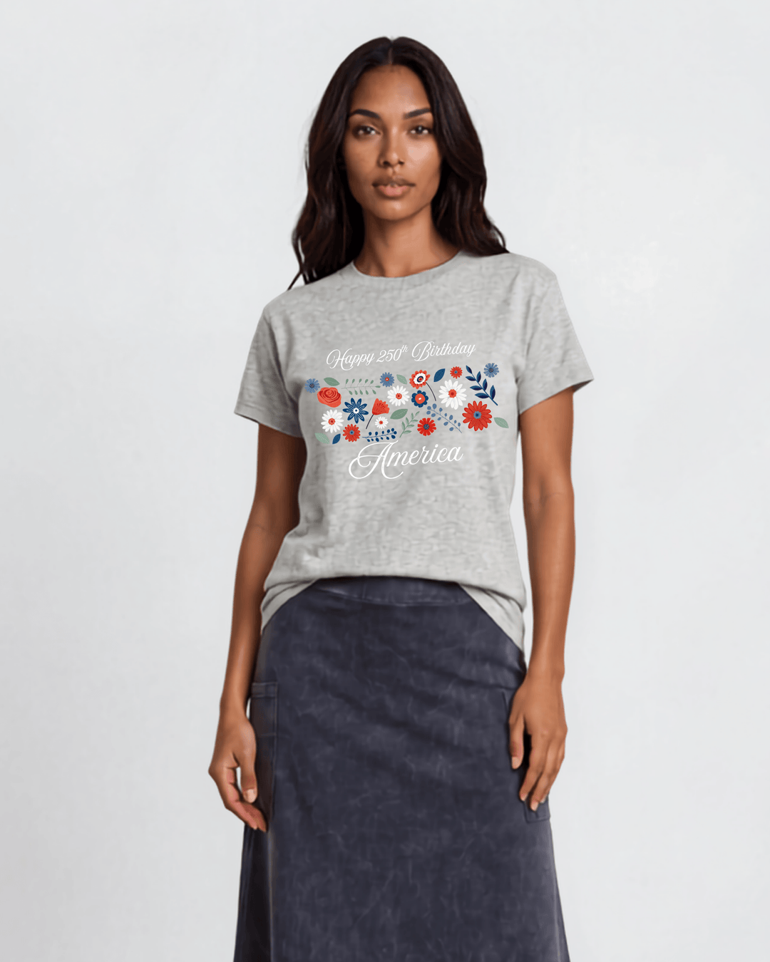 "Happy 250th Birthday America" floral graphic tee — red, white &amp; blue wildflowers on heather gray. Made in USA, 100% cotton, relaxed fit, XS–3X. Perfect for 4th of July.