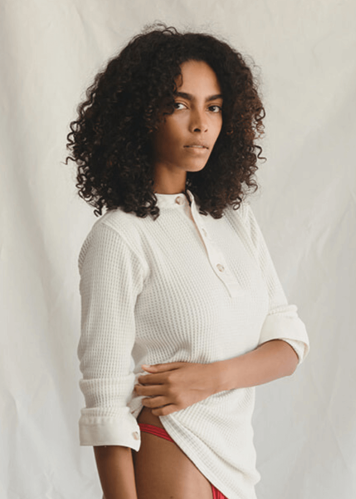 Get ready to cozy up in cloud-like softness with this waffle knit wonder by People of Leisure! Our three-button mock shirt is your new best friend, crafted from a dreamy blend of 50% Hemp, 48% Organic Cotton, and a hint of stretchy Spandex 