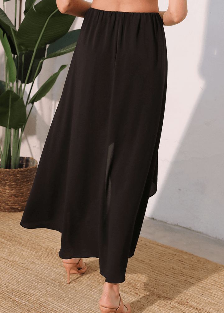 Elevate your everyday wardrobe with the Cascade High-Low Maxi Skirt in Black—a versatile piece that transitions seamlessly from casual to refined.  Made in USA