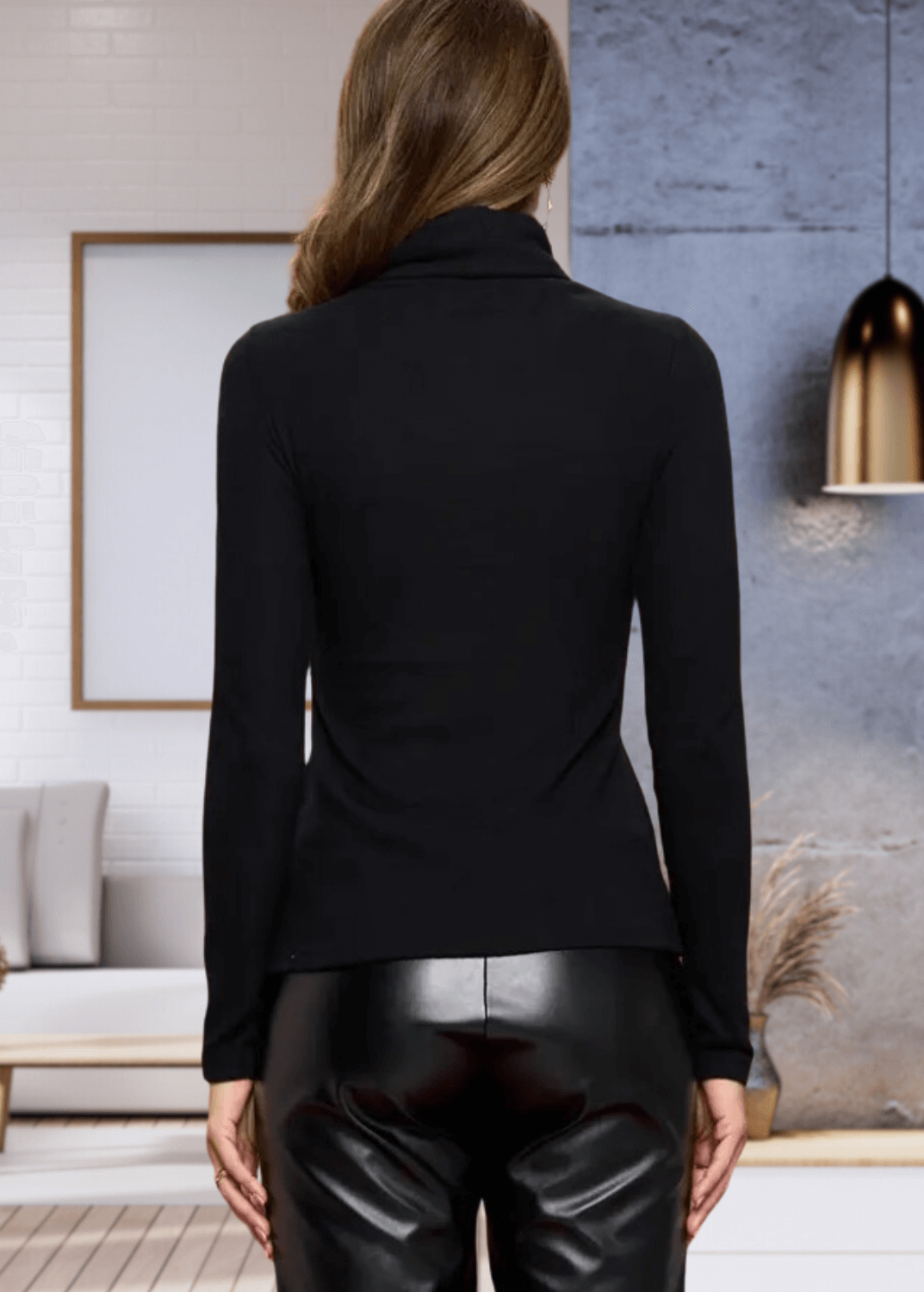 Made in USA, The Kate Classic Solid Knit Fitted Turtle Neck in Black offers a luxurious cashmere-like softness, crafted from a high-quality blend of 97% rayon and 3% spandex for comfortable stretch and fit. | Renee C Style# 2711TPF