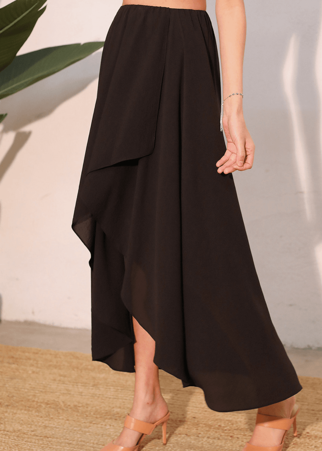 Elevate your everyday wardrobe with the Cascade High-Low Maxi Skirt in Black—a versatile piece that transitions seamlessly from casual to refined.  Made in USA