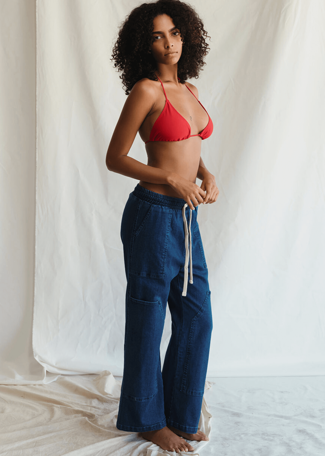 People of Leisure - Introducing the "Logan Pant" – your new standard in sustainable luxury. Crafted from 100% organic Cotton Candiani denim, these pants offer both impeccable style and environmental integrity. 