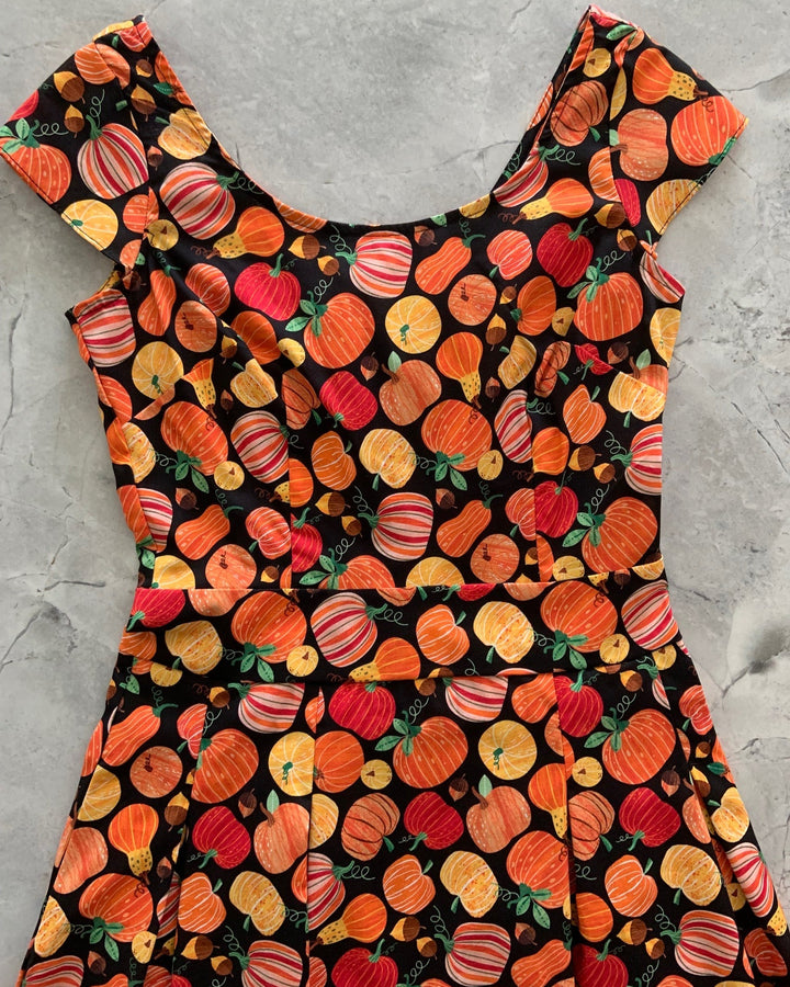 Made in USA. Shop the Gourdgeous Margaret cotton dress by Retrolicious, with cap sleeves, inverted pleats, an A-line skirt and pockets. Size up. So cute for Fall.