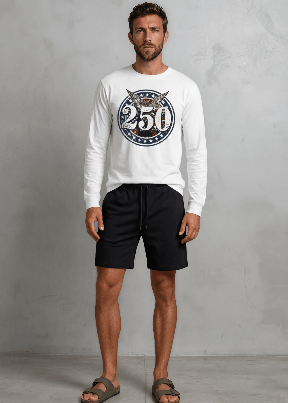 250 Emblem Eagle Patriotic Long Sleeve Tee — Made in USA with USA Cotton. Bold circle badge graphic on white, 100% pre-shrunk cotton. Perfect for 4th of July.