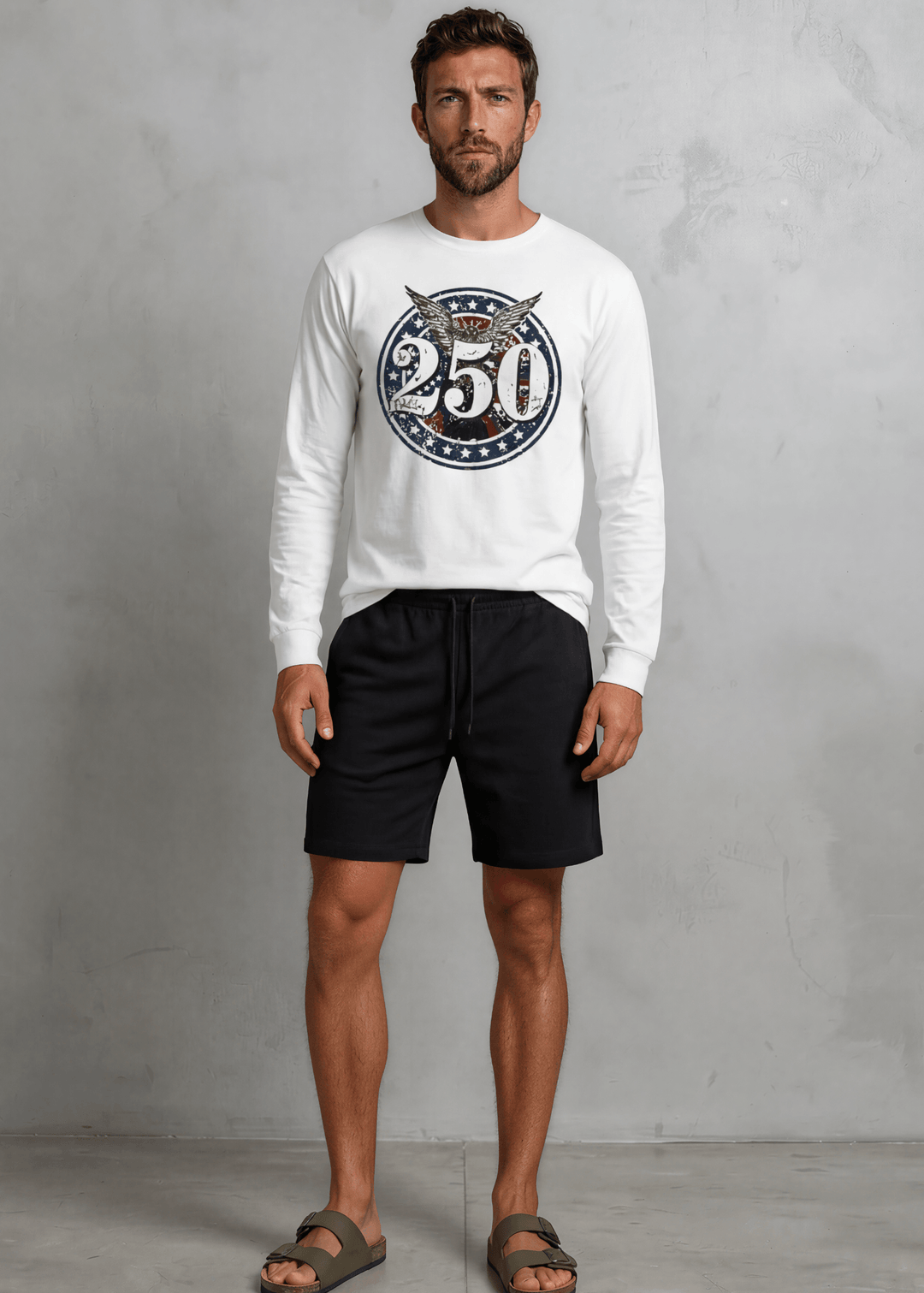 250 Emblem Eagle Patriotic Long Sleeve Tee — Made in USA with USA Cotton. Bold circle badge graphic on white, 100% pre-shrunk cotton. Perfect for 4th of July.