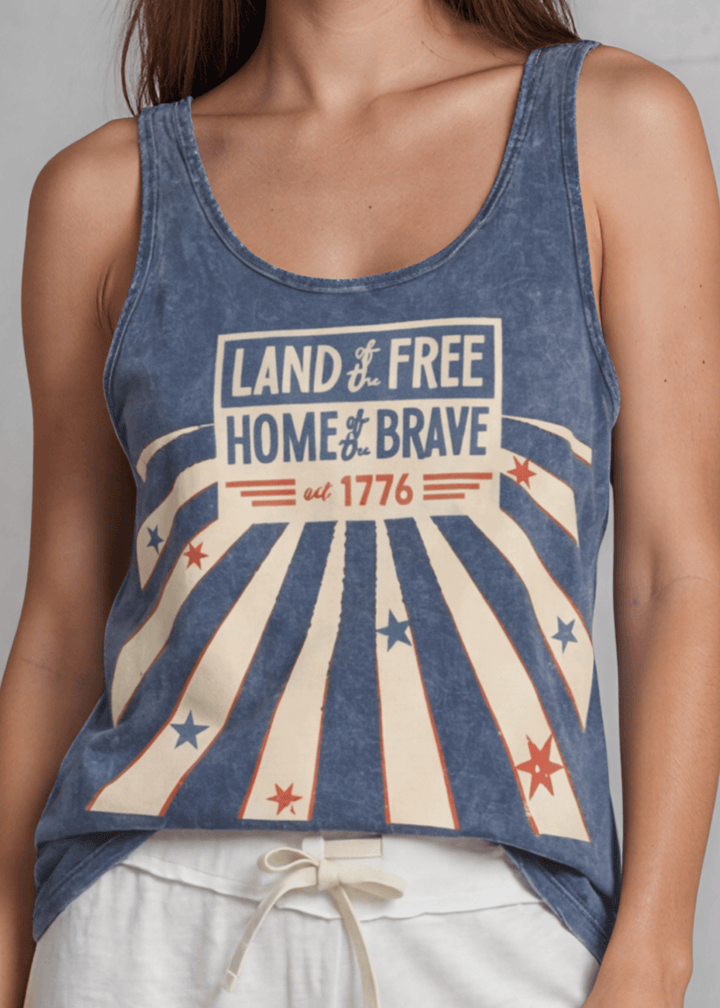 Land of the Free Home of the Brave Est. 1776 Graphic Tank — Made in USA with USA Grown Cotton. Mineral washed denim blue, soft 95% cotton. Perfect for 4th of July.
