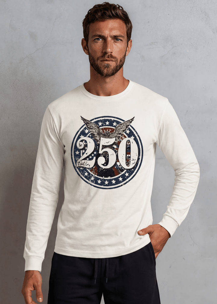 250 Emblem Eagle Patriotic Long Sleeve Tee — Made in USA with USA Cotton. Bold circle badge graphic on white, 100% pre-shrunk cotton. Perfect for 4th of July.