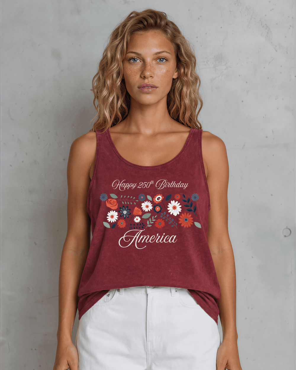 Celebrate July 4th in a USA-made, USA cotton-grown floral graphic tank top. Burnt Red Clay mineral wash, relaxed fit, soft & stretchy. Proudly made in America.