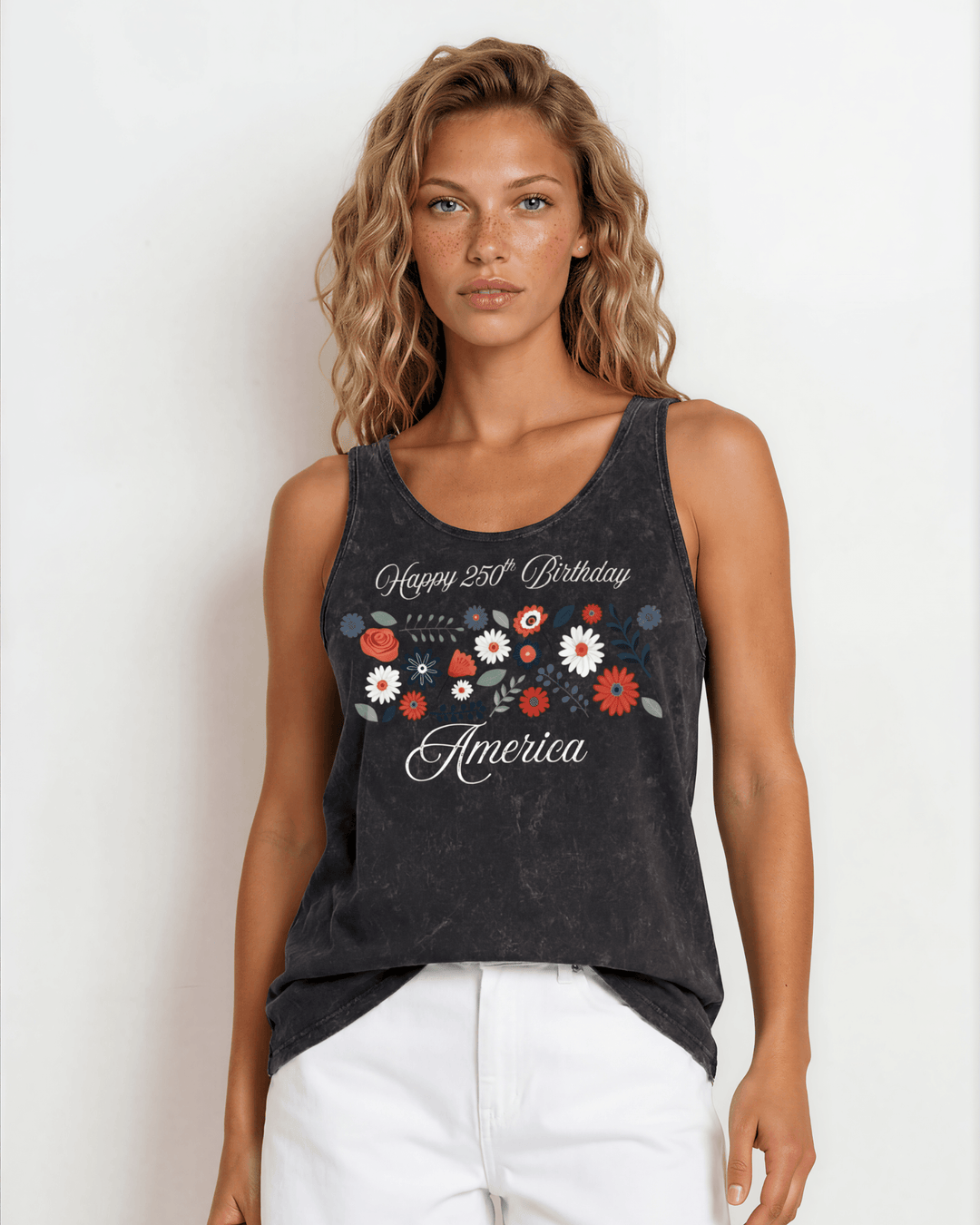 Celebrate July 4th in a USA-made, USA cotton-grown floral graphic tank top. Black mineral wash, relaxed fit, soft &amp; stretchy. Proudly made in America.