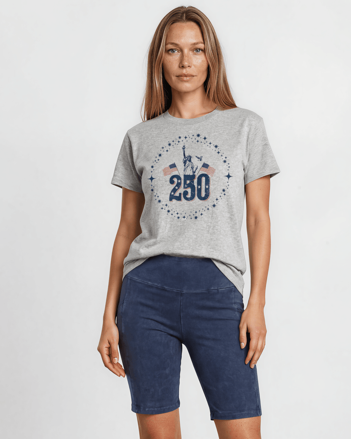250 Statue of Liberty Patriotic Graphic Tee — Made in USA. Lady Liberty &amp; American flags on heather gray, 100% cotton, relaxed fit. Perfect for 4th of July.