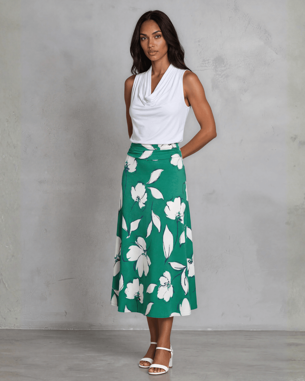 Shop the Marie Floral Maxi Skirt in bold green & white. A-line silhouette, ruched waistband, sizes S-L. 95% Poly/5% Spandex. Made in USA.