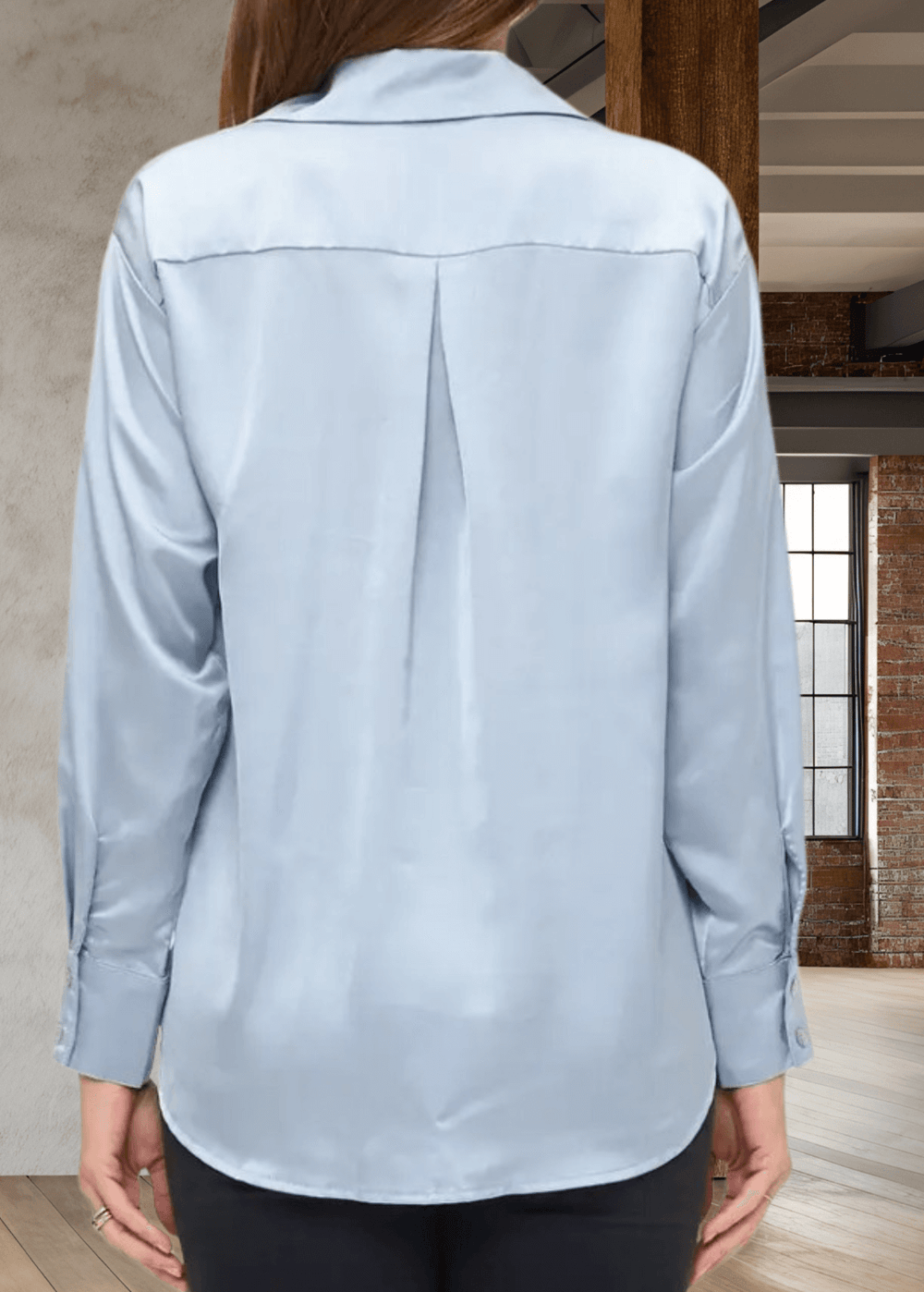 The Laura Satin Button Down Shirt in Steele Blue offers a refined blend of style and comfort. Made in the USA with 97% polyester and 3% spandex, this satin shirt features long sleeves, a classic collar, and a button-front closure for a polished look | Renee C. Style 5177TPA