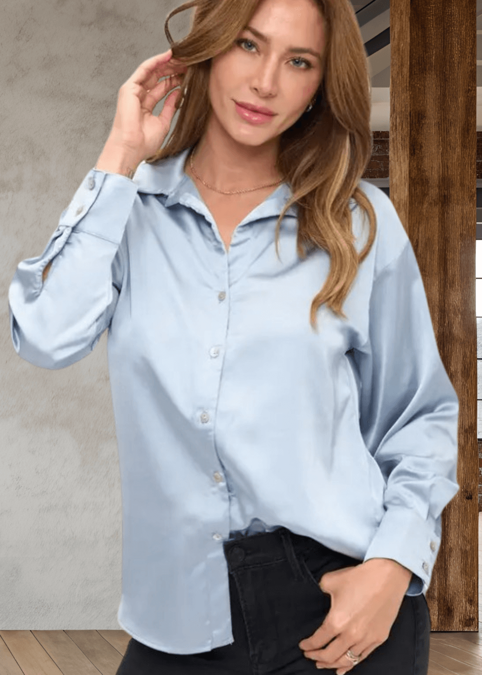 The Laura Satin Button Down Shirt in Steele Blue offers a refined blend of style and comfort. Made in the USA with 97% polyester and 3% spandex, this satin shirt features long sleeves, a classic collar, and a button-front closure for a polished look | Renee C. Style 5177TPA