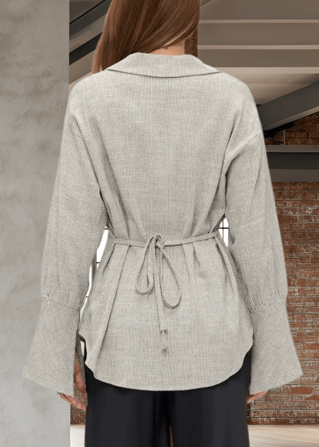 Elevate your wardrobe with the Made in USA Gabriella Cuff Detail Striped Top, featuring a classic collared design and long sleeves with stylish split bell cuffs. The tie-back detail adds a modern twist, while the subtle charcoal pinstripes on ivory make for a versatile, sophisticated look. Crafted from a breathable blend of cotton, rayon, and linen, this top offers all-day comfort and easy care with machine washable fabric. 