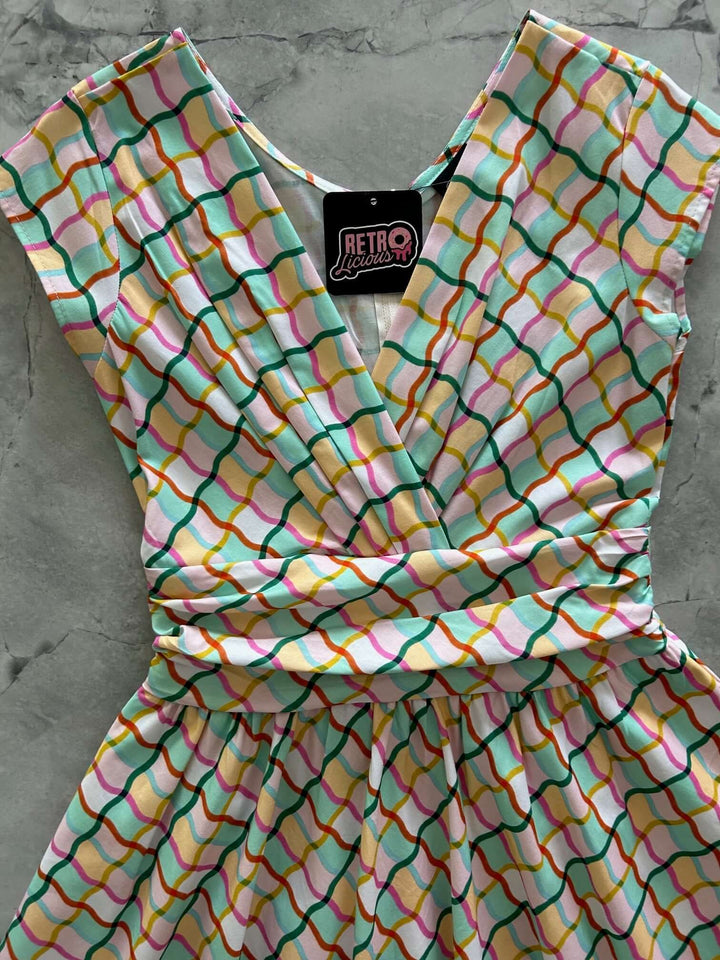 Made in USA, A women's vintage style piece with fun, modern details; our midi dress is now available in our Geometric print. Made from 100% cotton