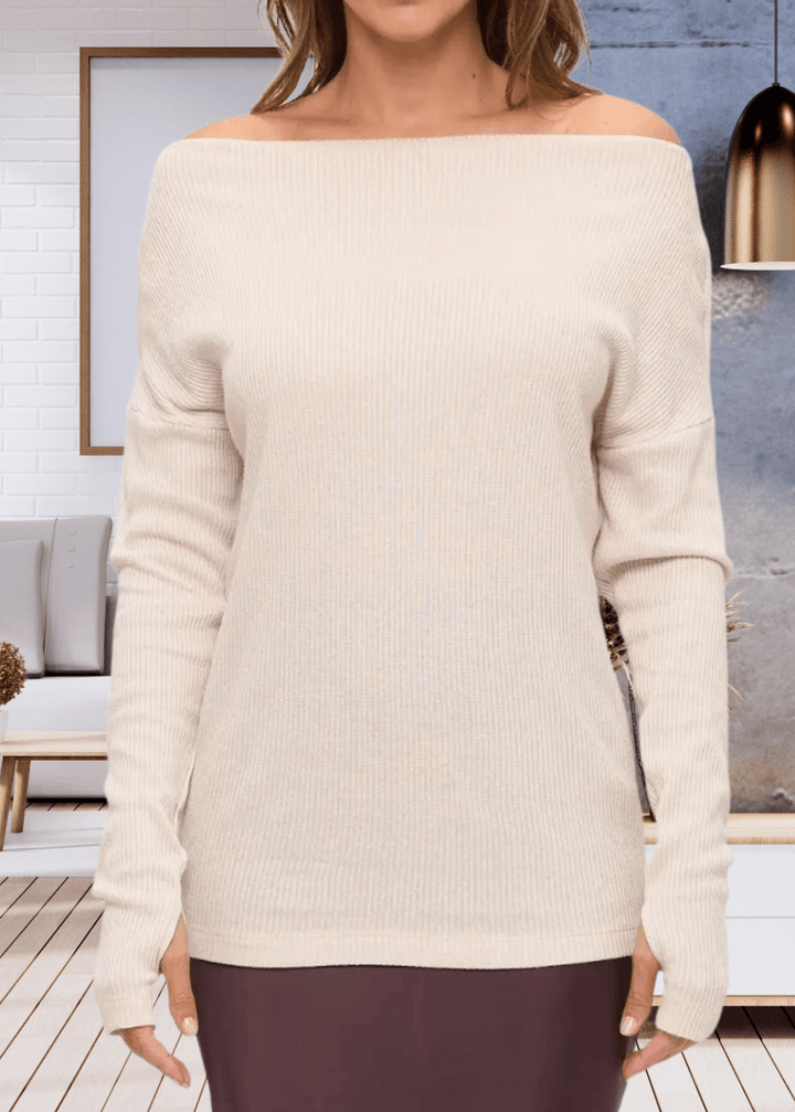 Experience ultimate comfort with the Grace Ribbed Knit Thumbhole Sweater, crafted in the USA from super soft rayon and spandex blend. Its relaxed dolman fit and boat neck create effortless style | Renee C Style# 5281TP
