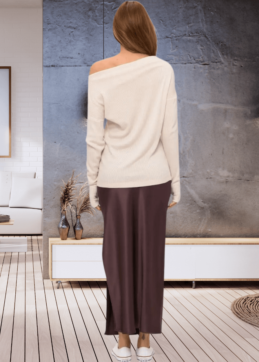 Experience ultimate comfort with the Grace Ribbed Knit Thumbhole Sweater, crafted in the USA from super soft rayon and spandex blend. Its relaxed dolman fit and boat neck create effortless style | Renee C Style# 5281TP