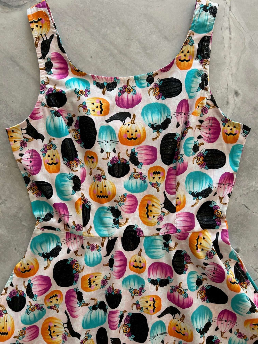 Made in USA. Shop the Pumpkin & Crow Skater Dress by Retrolicious, with stretch cotton fabric, a scoop neck, A-line skirt and hidden pockets. XS–4X.