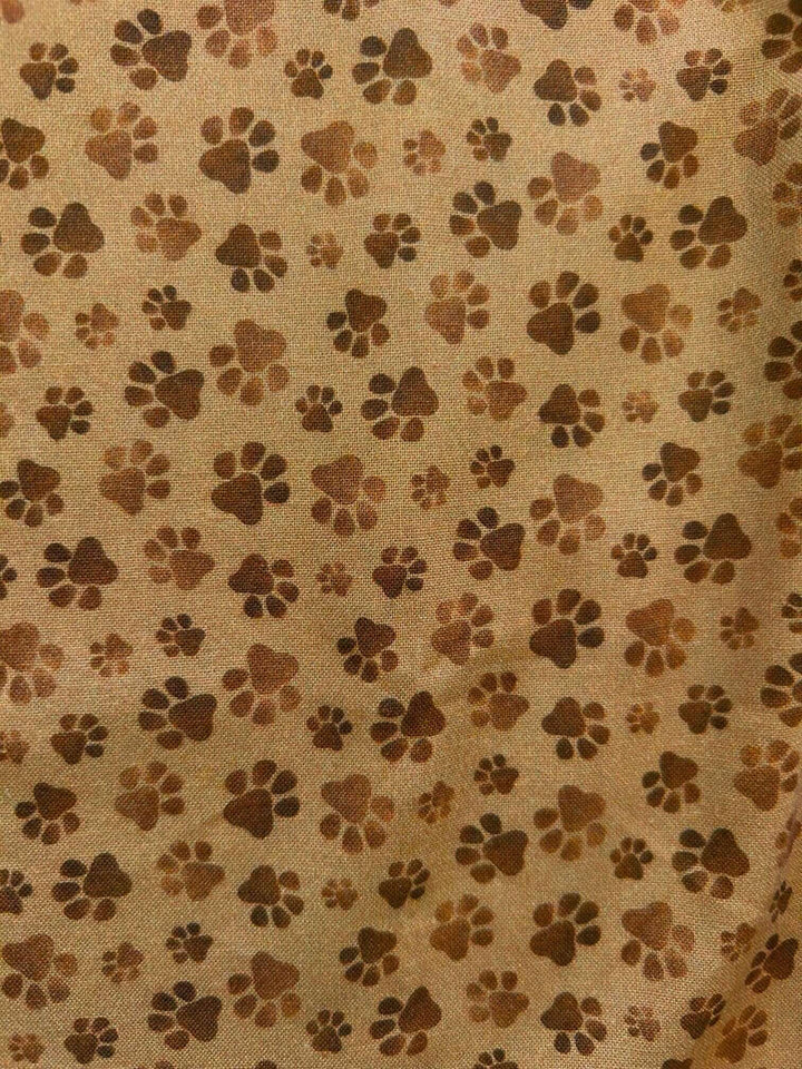 Vintage Style Tops This top is for the vintage lover at heart! Now available in our Paw print. This 100% cotton top features bust darts for a flattering silhouette, a side zippered closure for ease of wear, and an oversized bow at the neckline for that perfect 1950's inspired look.